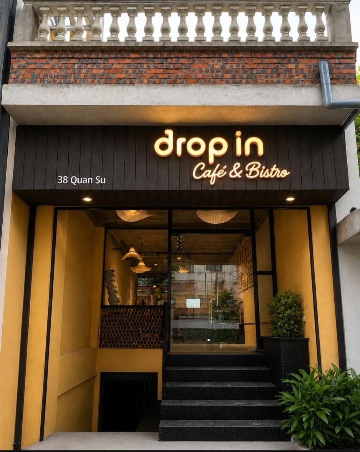 Drop In Café & Bistro entrance at 38 Quán Sứ